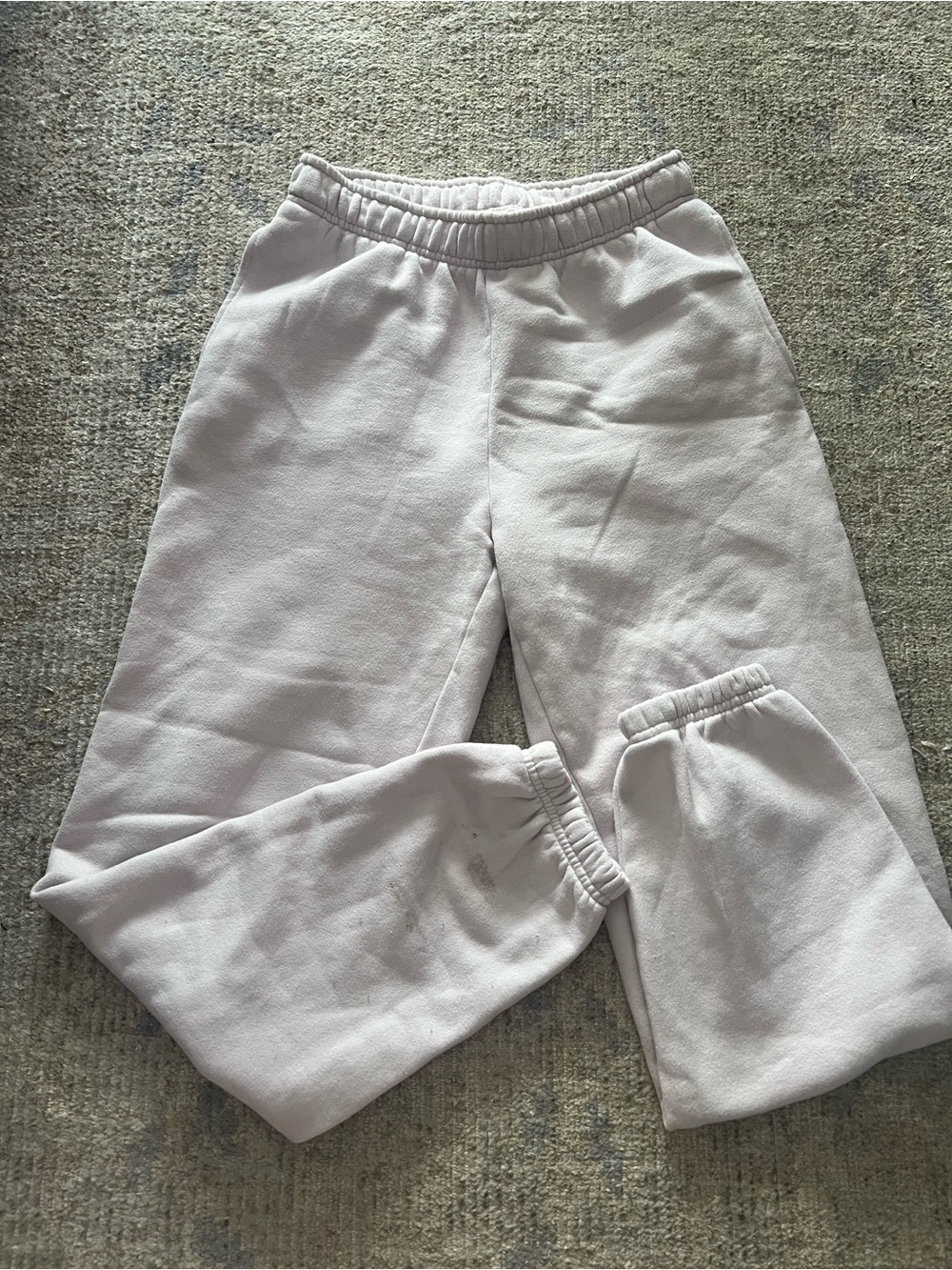 aritzia boyfriend sweats in a soft pink
